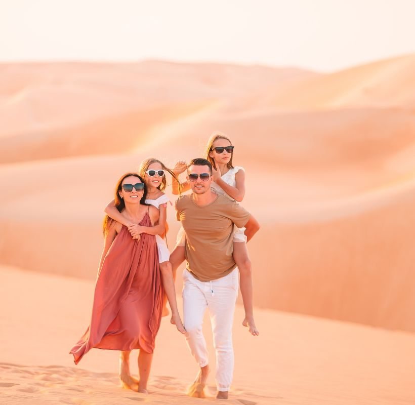 Family enjoying being in desert