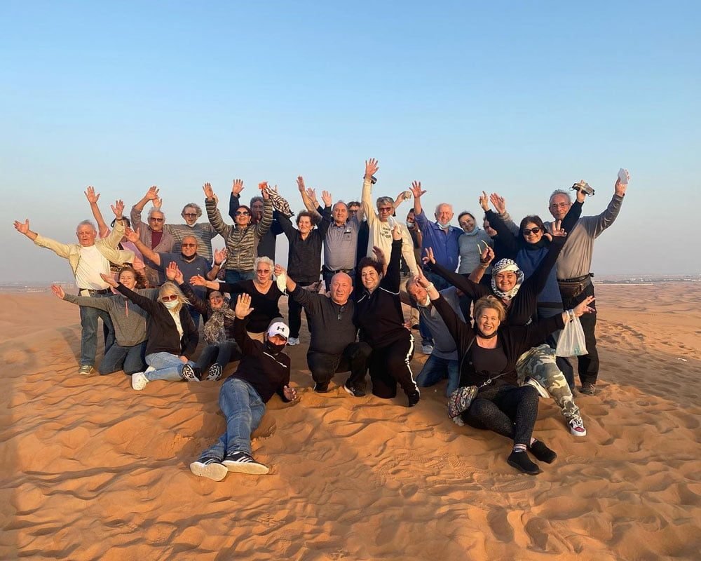 people enjoying morning in desert